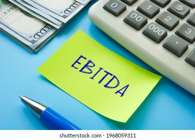 Financial concept meaning EBITDA Earnings Before Interest, Taxes, Depreciation and Amortization with phrase on the sheet. 