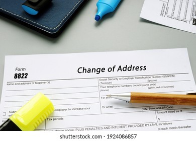  Financial concept meaning Form 8822 Change of Address with sign on the piece of paper.