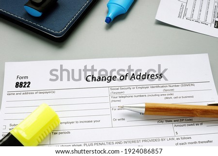  Financial concept meaning Form 8822 Change of Address with sign on the piece of paper.
