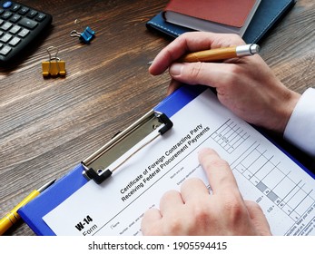  Financial Concept Meaning Form W-14 Certificate Of Foreign Contracting Party Receiving Federal Procurement Payments With Inscription On The Sheet.
