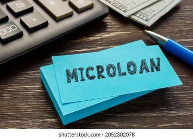 Financial Concept Meaning MICROLOAN With Inscription On The Page. 
