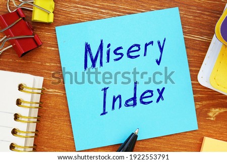 Financial concept meaning Misery Index with sign on the piece of paper.
