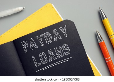 Financial Concept Meaning PAYDAY LOANS With Phrase On The Page. A payday Loan is cash Advance offered To Help You Get To Your Next Paycheck
