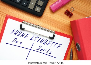  Financial concept meaning PHONE ETIQUETTE Do's and Don'ts with phrase on the piece of paper.