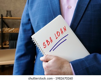 Financial Concept Meaning SBA LOAN Small Business Administration With Sign On The Piece Of Paper. 
