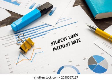 Financial Concept Meaning Student Loan Interest Rate With Sign On The Sheet. 
