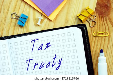 Financial Concept Meaning Tax Treaty With Phrase On The Piece Of Paper.