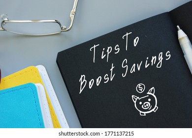 Financial Concept Meaning Tips To Boost Savings With Sign On The Sheet.