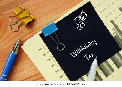 Financial concept meaning Withholding Tax with phrase on the sheet. - Shutterstock ID 1876981876