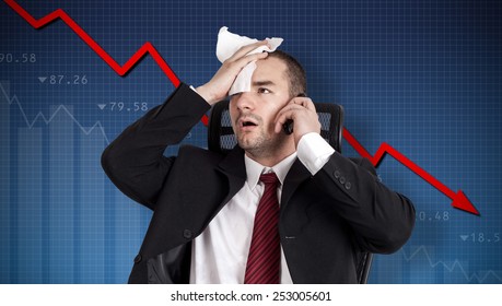 Financial crisis. Broker holding forehead