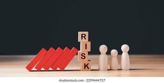 Financial Crisis, Economic, Business risk management concept. Risk word on wooden block, domino crisis effect. Concept Risk, Crisis, Management, Assessment, Insurance, Security, Financial, Economic