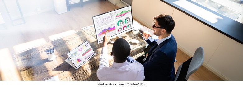 Financial Dashboard Graph On Desktop Computer Screen