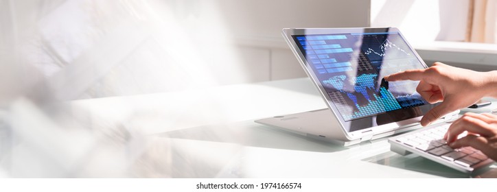 Financial Data Analyst Female Using KPI Dashboard On Laptop