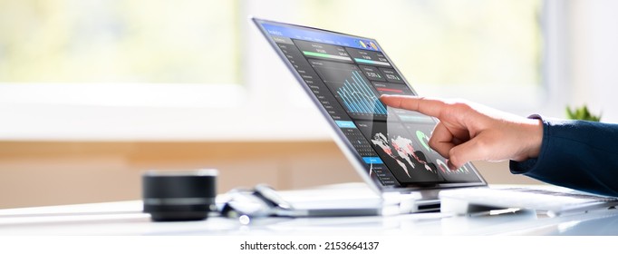 Financial Data Analyst Female Using KPI Dashboard On Laptop