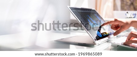 Financial Data Analyst Female Using KPI Dashboard On Laptop