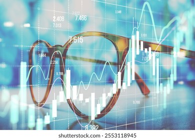 Financial data graphs and charts overlaying glasses on a desk with a blurred blue background, symbolizing market analysis and trading concepts