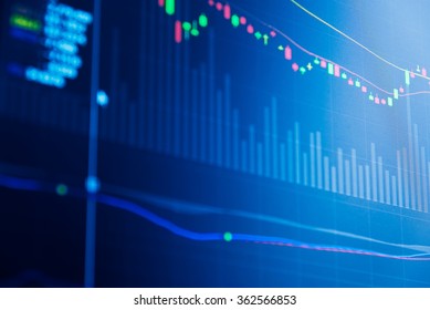 Financial data on a monitor. Business statistics and analytics, glowing sheet beznes statistics of exchange trading in the dark