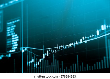 Financial data on a monitor. Business statistics and analytic, glowing sheet statistics of exchange trading in the dark. - business concept.