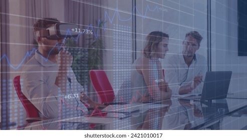 Financial data processing against man wearing vr headset at office. global business and finance concept