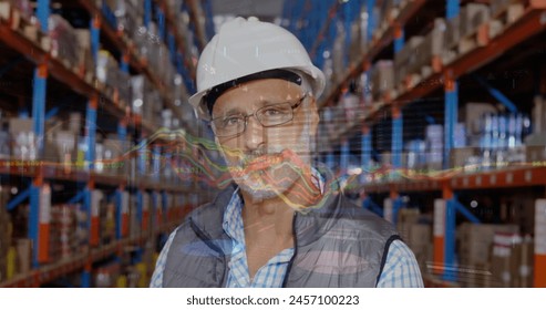 Financial data processing over portrait of caucasian senior male supervisor smiling at warehouse. Global finance and logistics business concept - Powered by Shutterstock