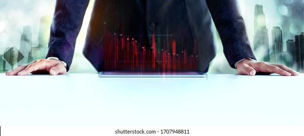 Financial Or Economy Crisis Concept. Business Leader. Stock Marketing Graph Is Going Crash And Down. Professional Businessman With Low Profit Graph On Tablet. Double Exposure Image