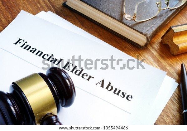 Financial Elder\
Abuse report and gavel in a\
court.