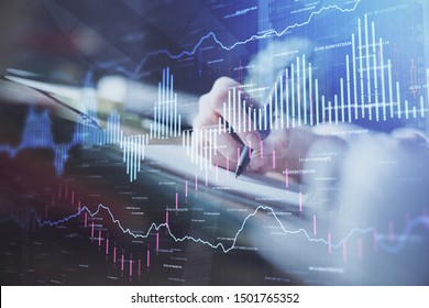 Financial forex graph displayed on hands taking notes background. Concept of research. Multi exposure