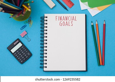 Financial Goals 2019 Year. Blank Spiral Notebook For Business Concept For Income Money Plans And Goals For The Year. Freelancer Workplace Concept. Top View With Copy Space For Input The Text. 