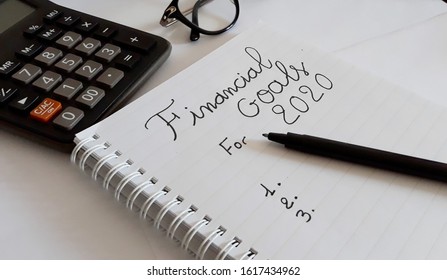 Financial Goals For 2020 Text Written On Notebook 