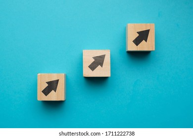 Financial growth concept with icons on wooden blocks. Close up. - Shutterstock ID 1711222738