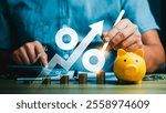 Financial Growth and Investment Strategy Concept Featuring Stacked Coins, Rising Percentage Icons, and Yellow Piggy Bank Symbolizing Savings, Wealth Management, Budgeting, and Economic Success