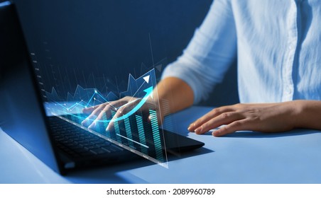 Financial infographic  annual statistics.
Business person analyzing financial annual statistics displayed on virtual  screen. Growth the company's annual revenue to success. - Shutterstock ID 2089960789