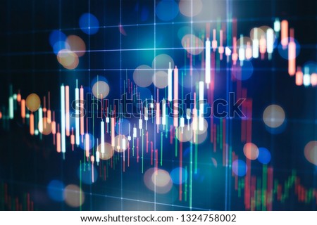 financial instruments with various type of indicators including volume analysis for professional technical analysis on the monitor of a computer. Fundamental and technical analysis concept.