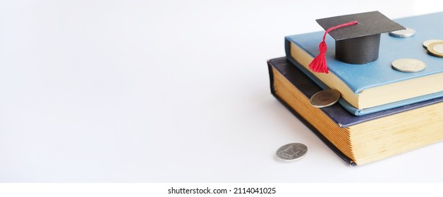 Financial Literacy Course. Education Costs Concept. Graduation Cap On Books Banner. Copy Space