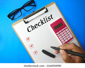 Financial Planning Checklist With Clipboard,calculator,pen And Spectacle. 