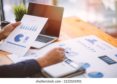 Financial planning Report ,Businessman working at office with documents on his desk, doing planning analyzing the financial report, business plan investment, finance analysis concept