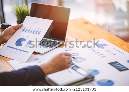 Financial planning Report ,Businessman working at office with documents on his desk, doing planning analyzing the financial report, business plan investment, finance analysis concept