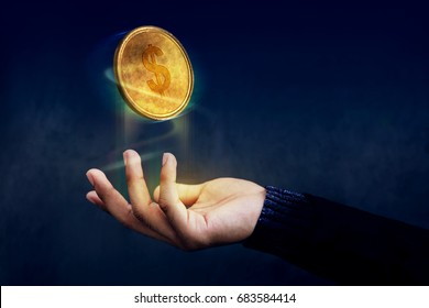 Financial Or Profit As Easy Concept, Golden Money Coin Float Over Magician Hand Like A Magic, Dark Light