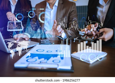 Financial report data of business operations (balance sheet and income statement and diagram) as Fintech concept.Business team meeting. digital tablet and computer laptop. - Shutterstock ID 1986256277