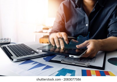 Financial Report Data Of Business Operations (balance Sheet And Income Statement And Diagram) As Fintech Concept.Business Team Meeting. Digital Tablet And Computer Laptop.