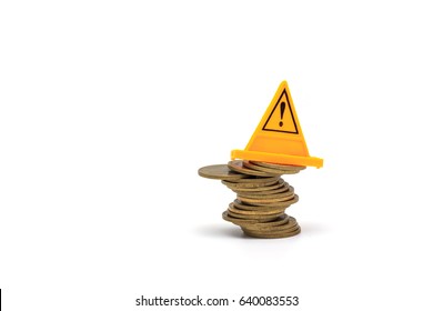 Financial Risk. Coins Falling And Warning Label On Whitebackground