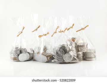 Financial saving and background concept - Close up bags of coins on white background for financial and saving artwork
