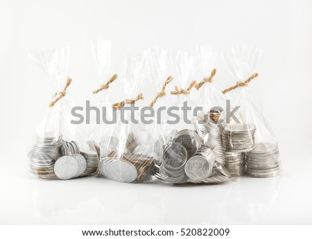 Financial saving and background concept - Close up bags of coins on white background for financial and saving artwork