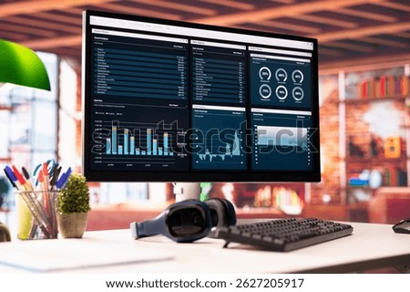 Financial software user interface on PC screen in apartment showing company growth graphs. Close up of accounting sales statistics on computer display showing economical figures and income