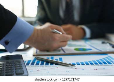 Financial statistics documents ball pen infographics at office table closeup. Internal Revenue Service inspector sum check investigation exchange market earnings savings loan and credit concept