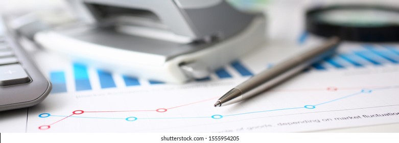 Financial Statistics Documents Ball Pen Infographics At Office Table Closeup. Internal Revenue Service Inspector Sum Check, Investigation, Exchange Market, Earnings, Savings, Loan And Credit Concept