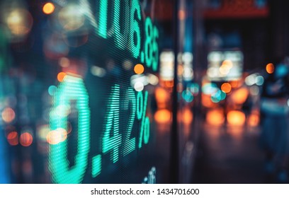 Financial stock exchange market display screen board on the street, selective focus

