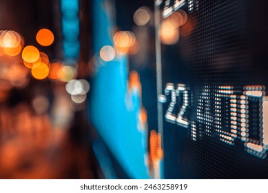 Financial stock exchange market display screen board on the street, selective focus - Powered by Shutterstock