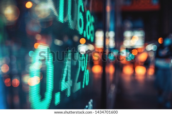 Financial stock exchange market display screen\
board on the street, selective\
focus\
\

