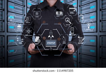 Financial technology flowchart and basic income mining cryptocurrency with blockchain startup unicorn crypto money virtual diagram.tablet computer in a hands on server room